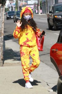 Skai Jackson in a Yellow Tie Dye Sweatsuit