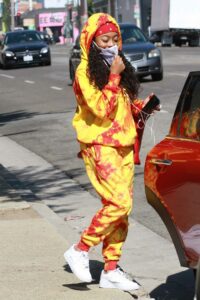 Skai Jackson in a Yellow Tie Dye Sweatsuit