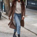 AJ Odudu in a Brown Leather Trench Coat Leaves the Global Radio Studios in London 11/26/2020