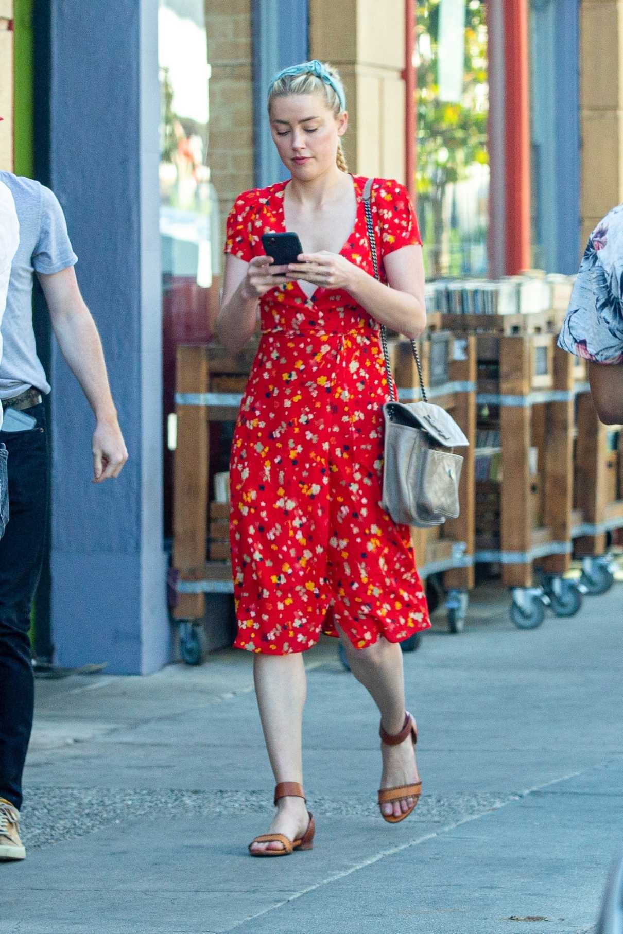 Amber Heard in a Red Floral Dress