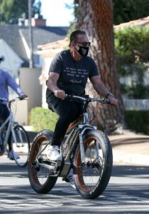 Arnold Schwarzenegger in a Black Tee