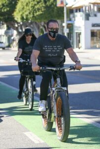 Arnold Schwarzenegger in a Black Tee
