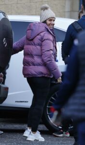 Becky Nicholson in a Purple Puffer Jacket