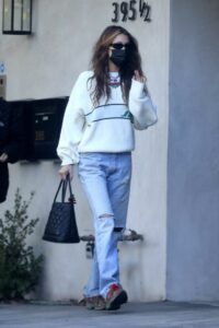 Bella Hadid in a Blue Ripped Jeans