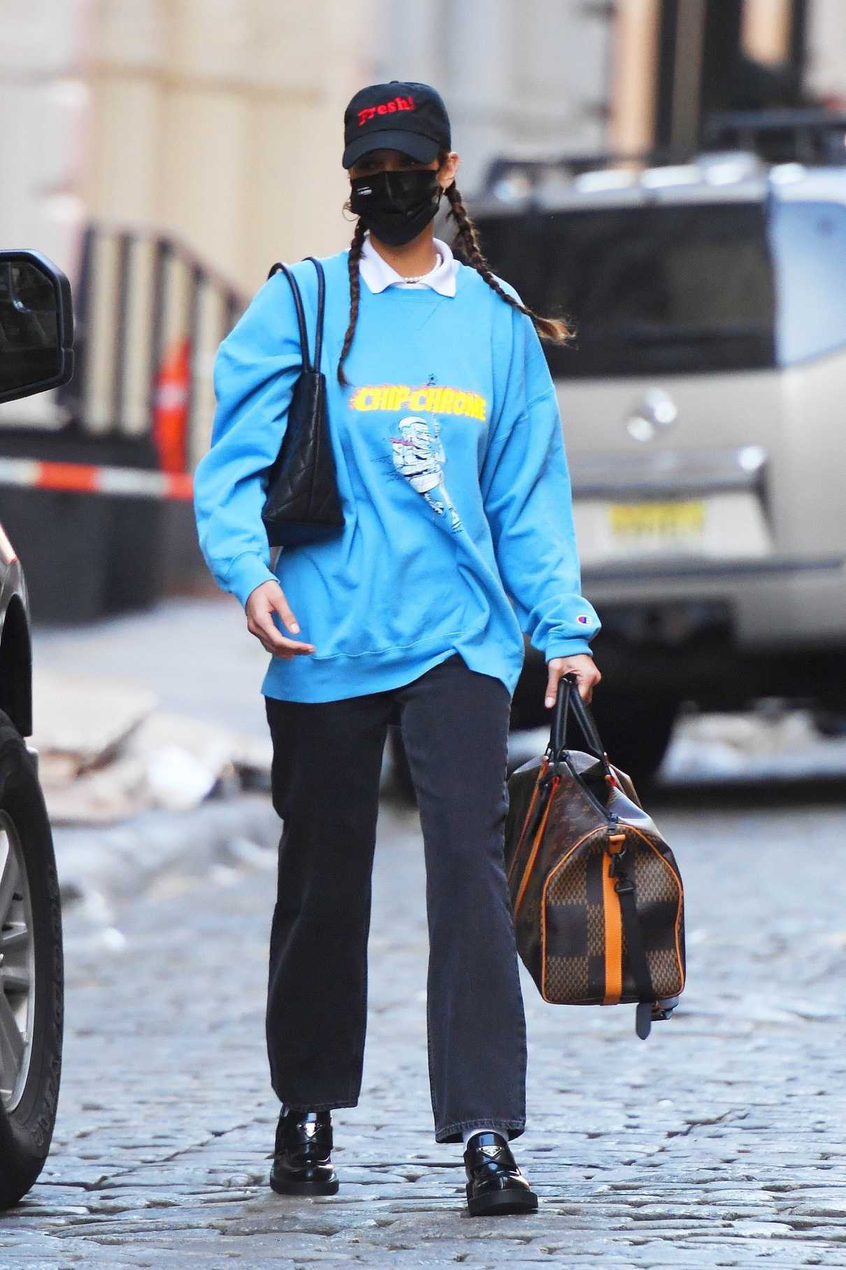 Bella Hadid in a Light Blue Sweatshirt