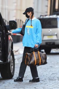 Bella Hadid in a Light Blue Sweatshirt