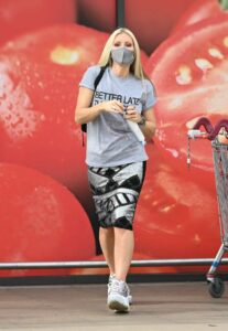 Caprice Bourret in a Gray Tee