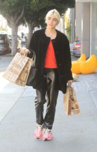 Charlene Laurent in a Black Cardigan