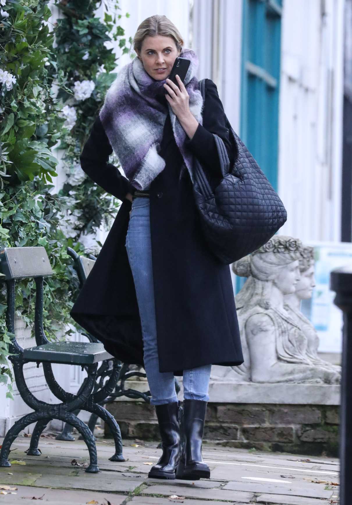 Donna Air in a Black Coat