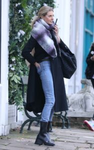 Donna Air in a Black Coat