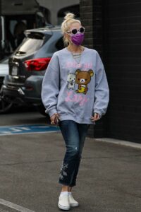 Gwen Stefani in a Purple Protective Mask