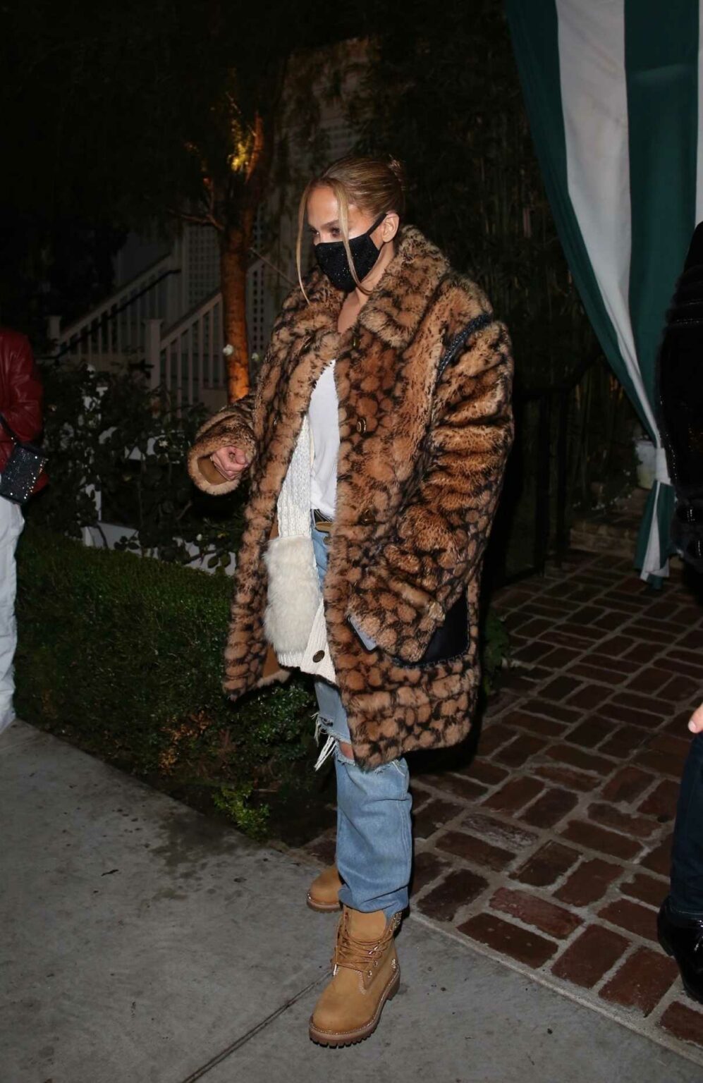Jennifer Lopez in an Animal Print Fur Coat Leaves Dinner at San Vicente