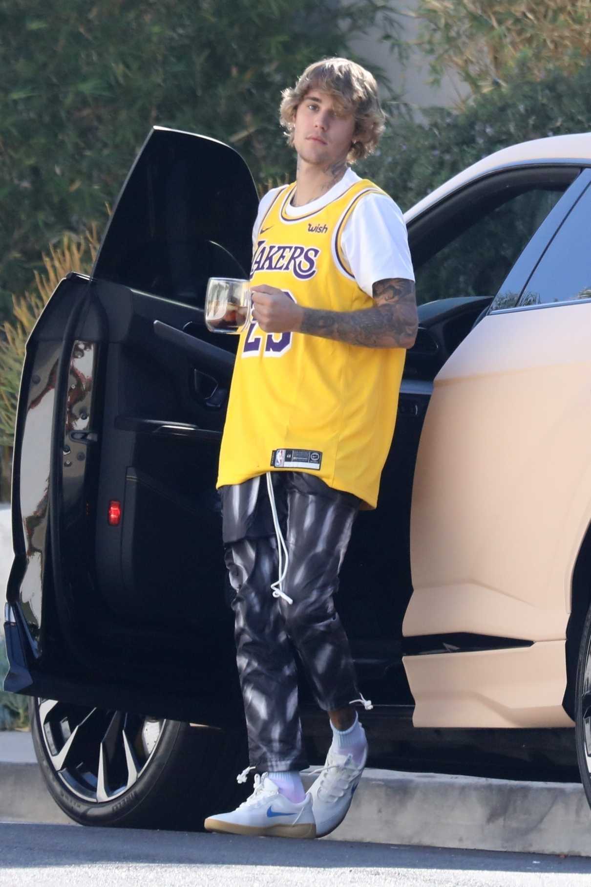Justin Bieber in a Yellow Tank Top