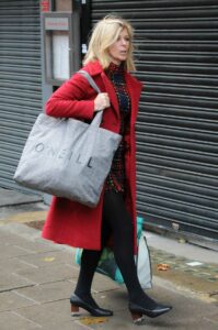 Kate Garraway in a Red Coat