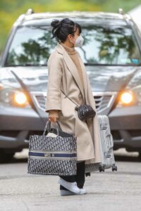 Lily Allen in a Beige Coat