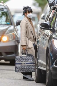 Lily Allen in a Beige Coat