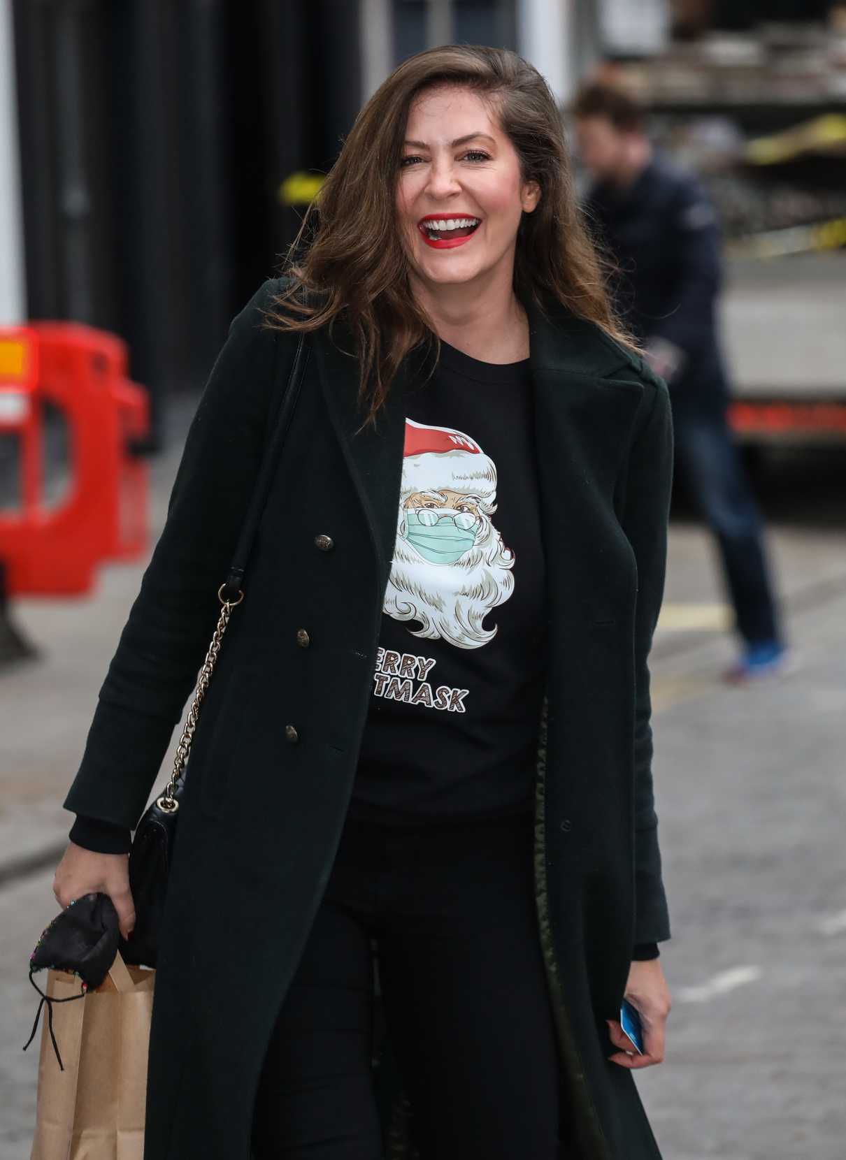 Lucy Horobin in a Black Coat Arrives at the Global Radio Studios in ...