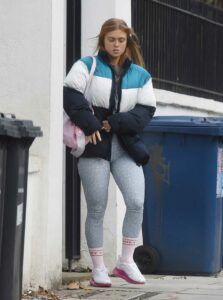 Maisie Smith in a Grey Leggings