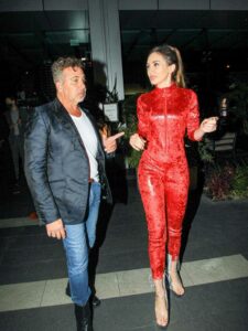 Megan Pormer in a Red Catsuit