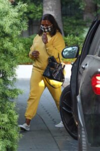 Mindy Kaling in a Yellow Sweatsuit