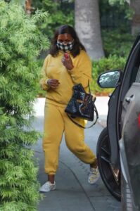 Mindy Kaling in a Yellow Sweatsuit