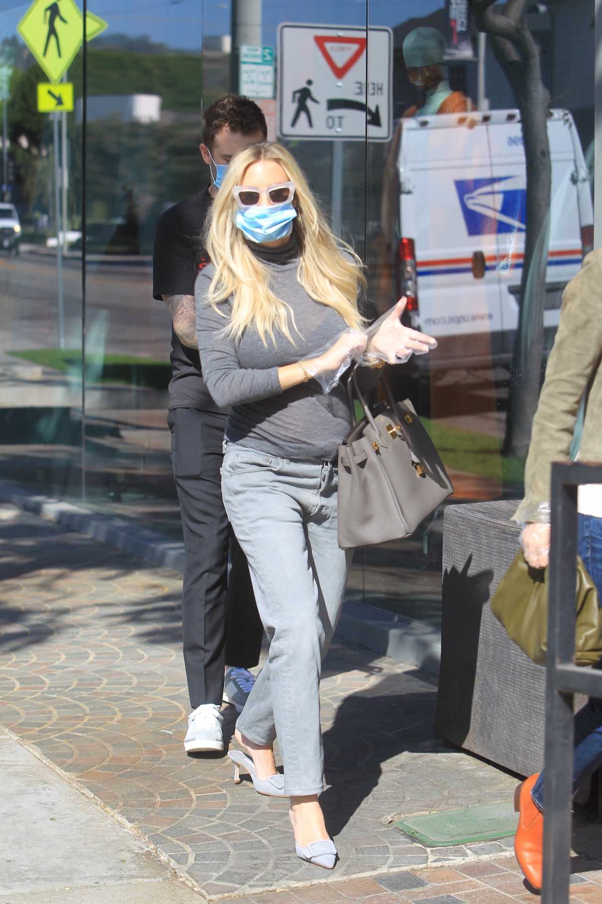 Morgan Stewart in a Grey Turtleneck Gets Some Shopping Done at Couture ...