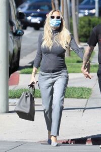 Morgan Stewart in a Grey Turtleneck