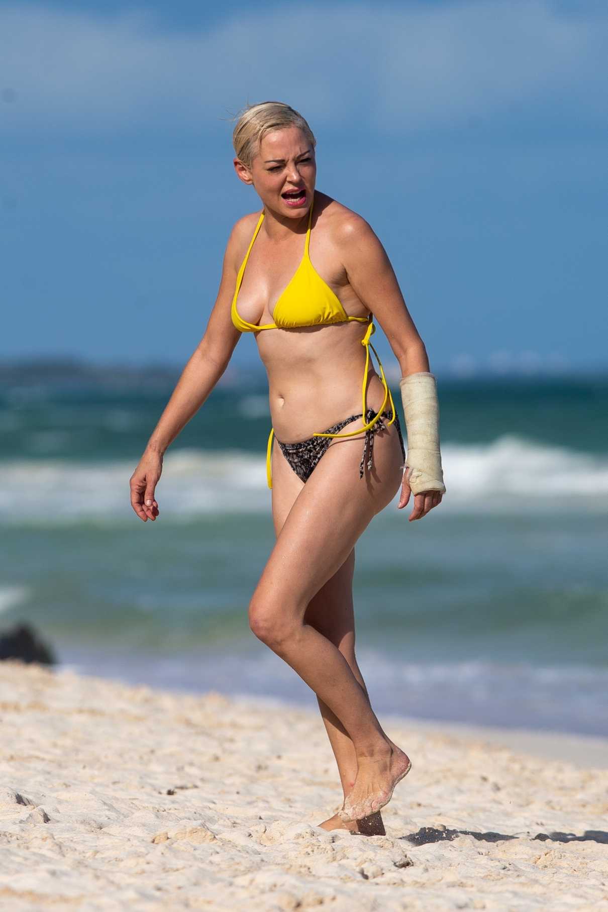Rose McGowan in a Yellow Bikini
