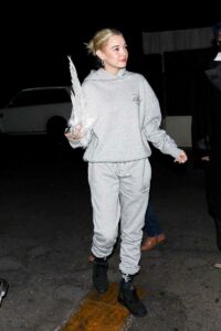 Sarah Snyder in a Grey Sweatsuit
