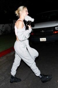 Sarah Snyder in a Grey Sweatsuit