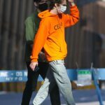 Timothee Chalamet in an Orange Hoodie Was Seen Out with a Friend in New York City 11/08/2020