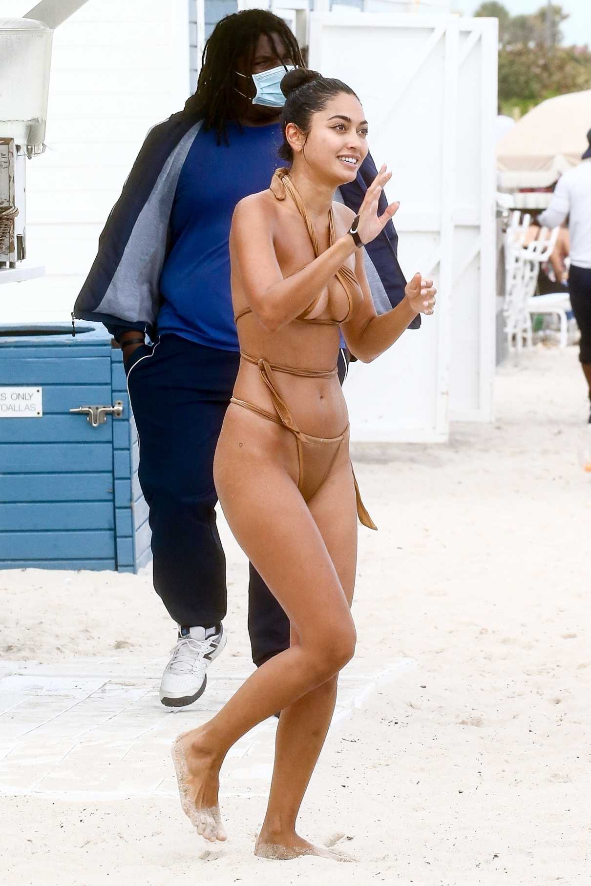 Ambra Gutierrez in a Gold Bikini