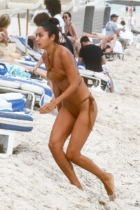 Ambra Gutierrez in a Gold Bikini