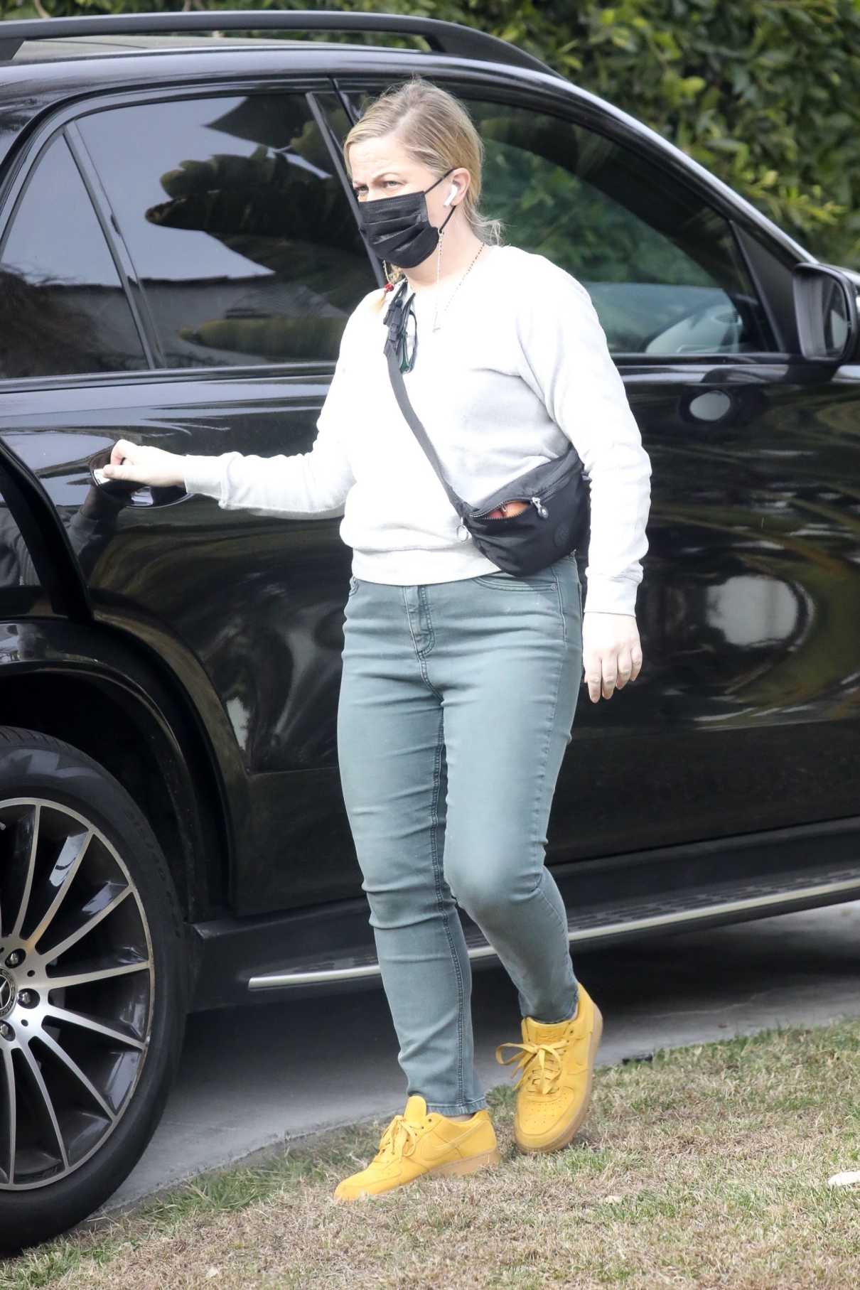 Amy Poehler in a Black Protective Mask