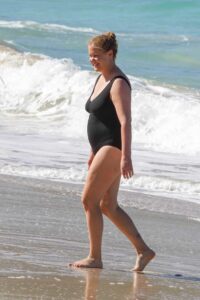 Amy Schumer in a Black Swimsuit