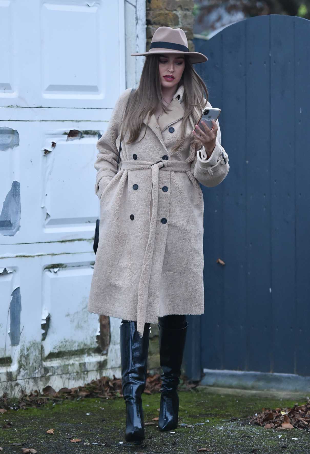 Chloe Ross in a Beige Coat