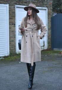 Chloe Ross in a Beige Coat