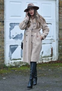 Chloe Ross in a Beige Coat