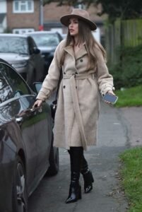 Chloe Ross in a Beige Coat