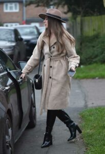 Chloe Ross in a Beige Coat