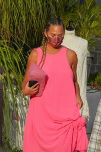 Chrissy Teigen in a Pink Dress