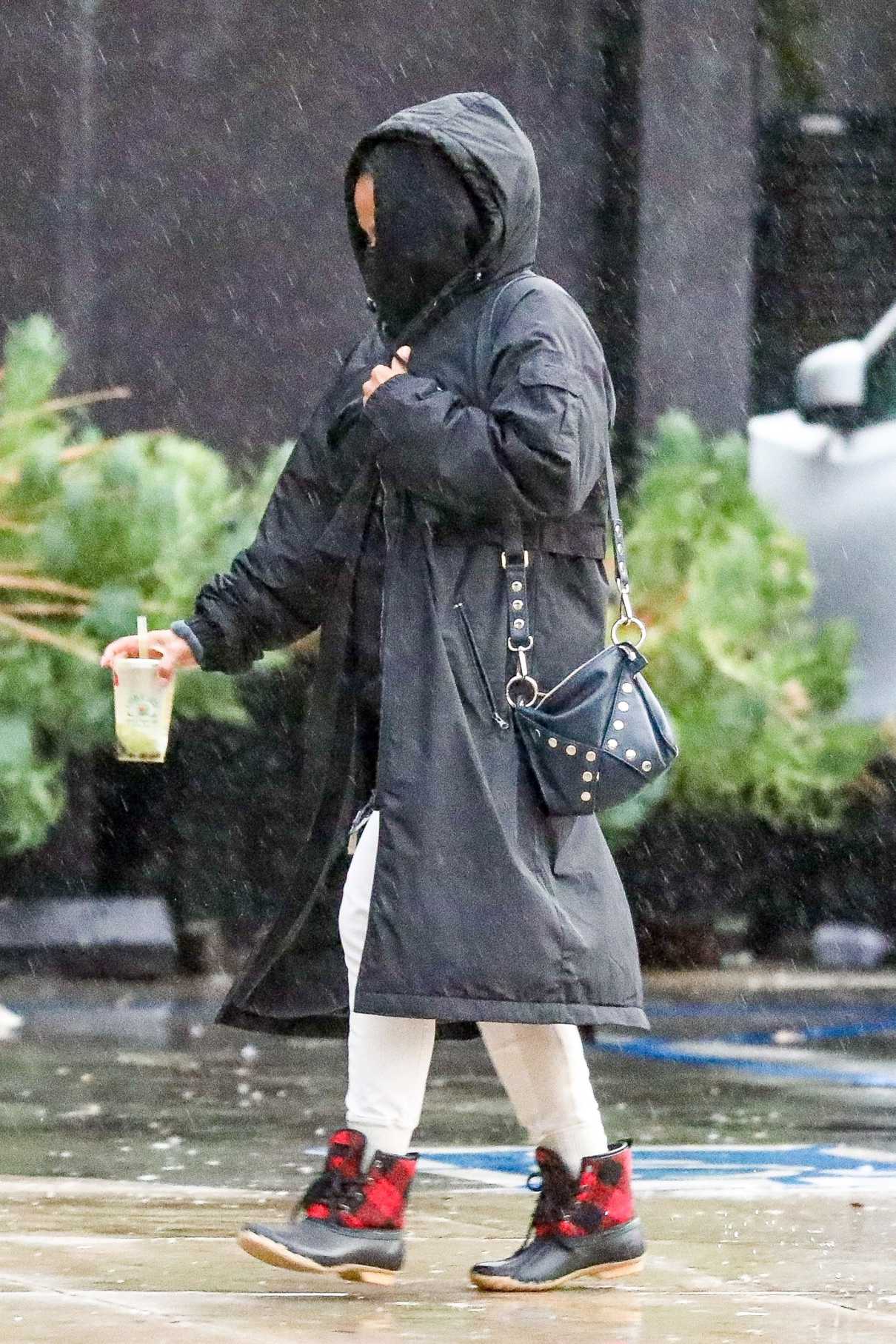 Christina Milian in a Black Puffer Coat