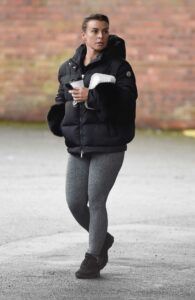 Coleen Rooney in a Black Puffer Jacket