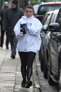 Coleen Rooney in a White Hoodie