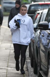 Coleen Rooney in a White Hoodie