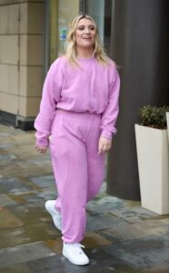 Ella Henderson in a Purple Sweatsuit