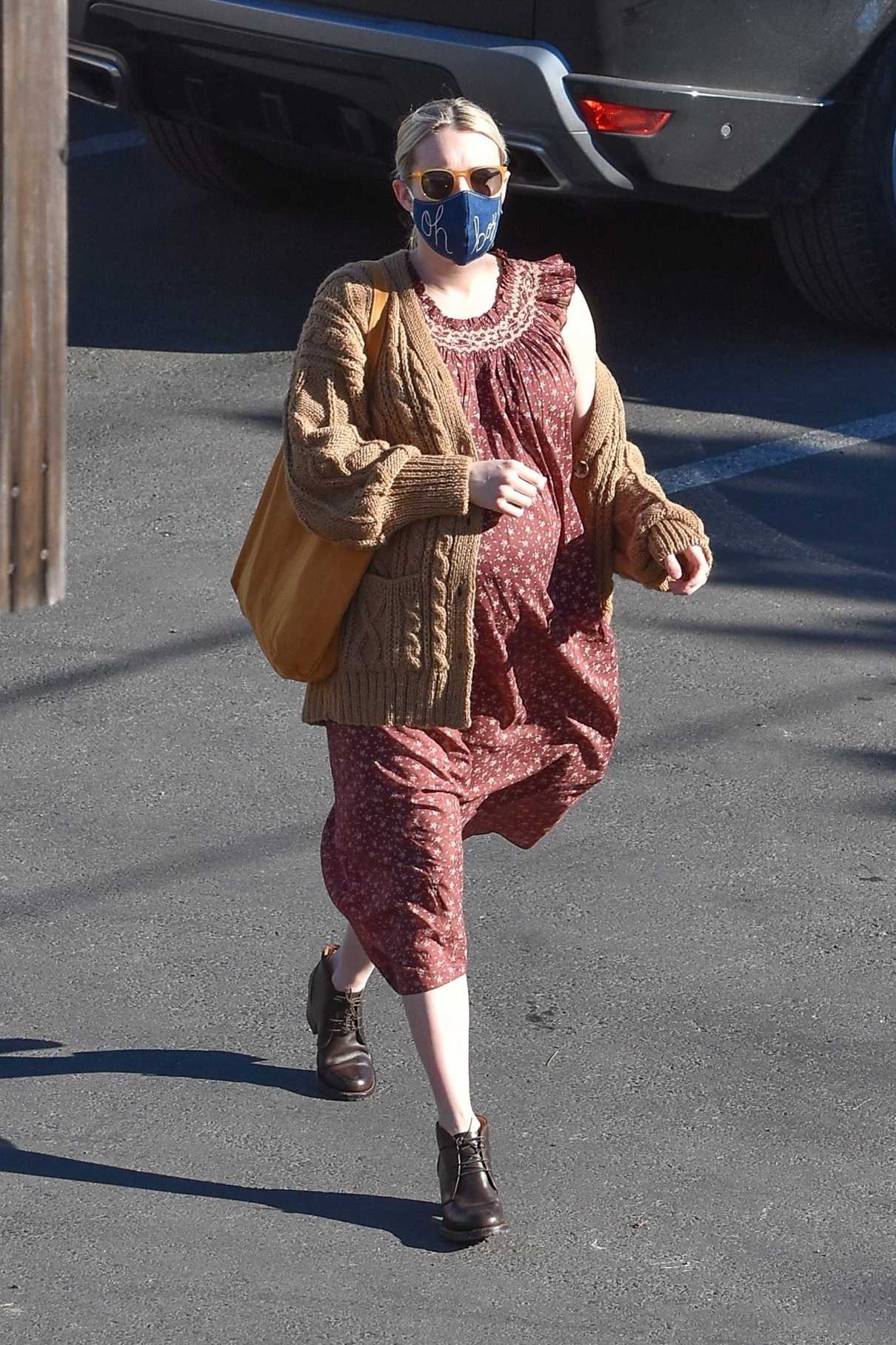 Emma Roberts in a Beige Cardigan