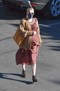 Emma Roberts in a Beige Cardigan