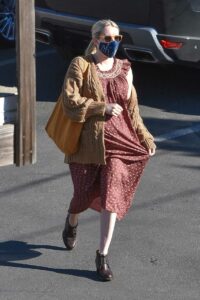 Emma Roberts in a Beige Cardigan