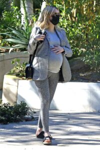 Emma Roberts in a Grey Blazer